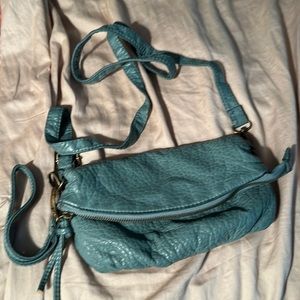 Mini Crossbody Clutch style bag with adjustable and wristlet straps